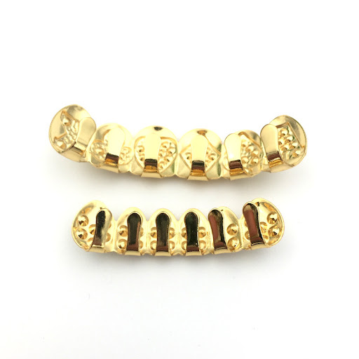 Title 2, Diamond-studded gold teeth for a dazzling smile...