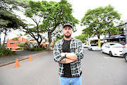 Matt Richardson of  Republik in Florida Road stands in the road between his restaurant  and  rival establishment Dropkick Murphy's and a Catholic church. 