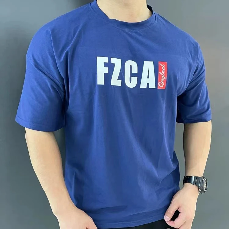 Camiseta Esportiva Casual Masculina Verão Manga Curta Solta Marca de Moda Roupas de Treino Top Meia Manga Treino ao Ar Livre Confortável
