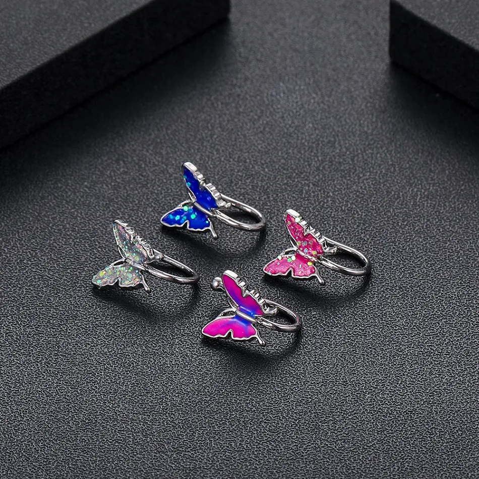 Oliedruppel Vlinder Neusclip Nep Ring Piercing Sieraden. Voeg een vleugje glamour toe aan je look met deze unieke neusclip.
