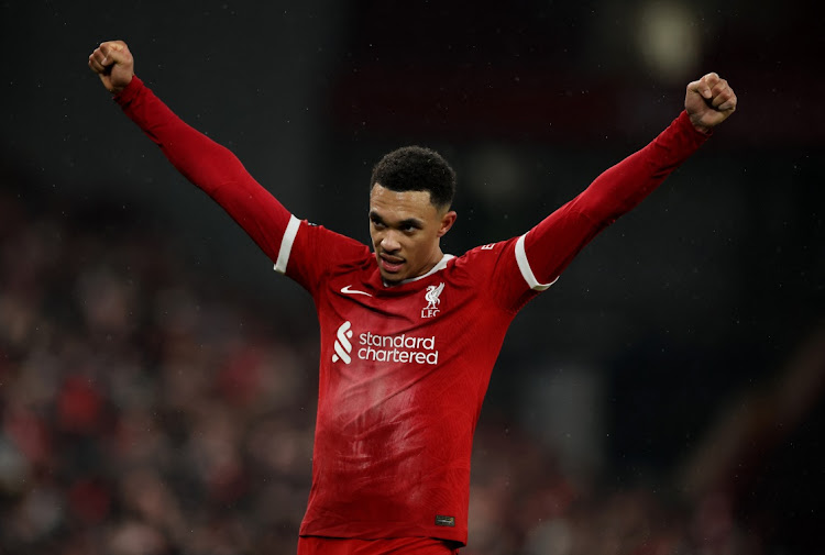 Liverpool's Trent Alexander-Arnold celebrates after the their Premier League win against Fulham at Anfield in Liverpool on Sunday.