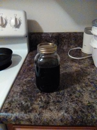 Home made elderberry medicinal syrup.