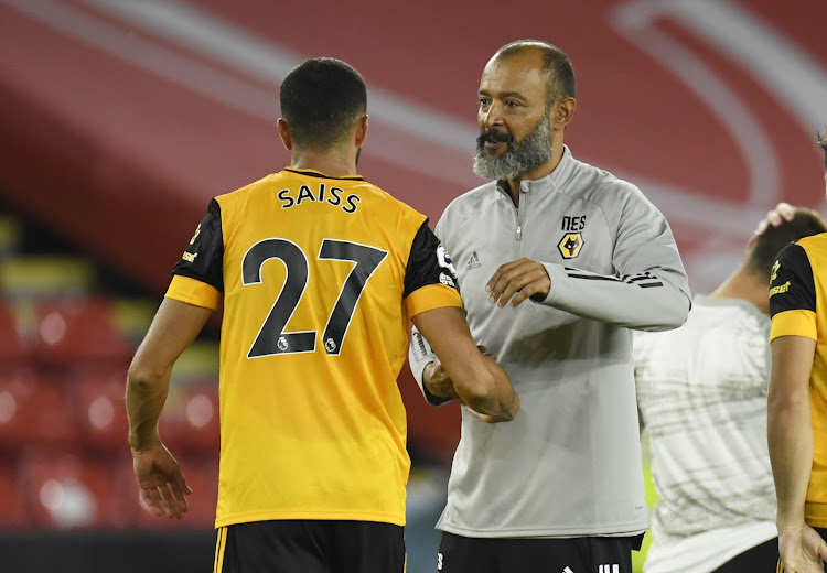 Wolves' boss Nuno Espirito Santo and Wolverhampton Wanderers' Romain Saiss celebrate after the match