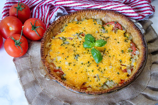 Tomato Herb Pie ready to be sliced.