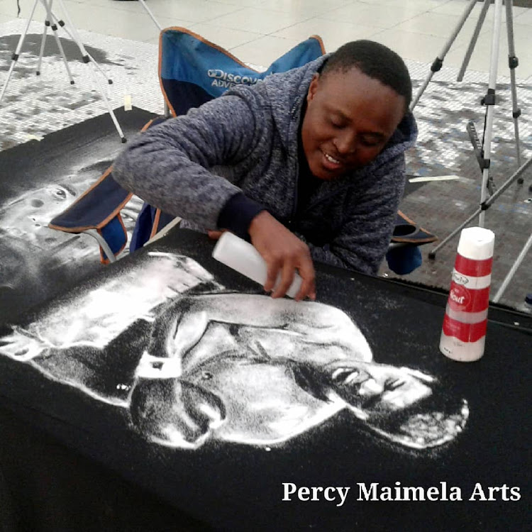 Percy Maimela creating a portrait of Mohammed Ali using salt