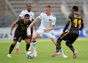 Jesse Donn of Supersport United challenged by Keagan Dolly and Khama Billiat of Kaizer Chiefs.