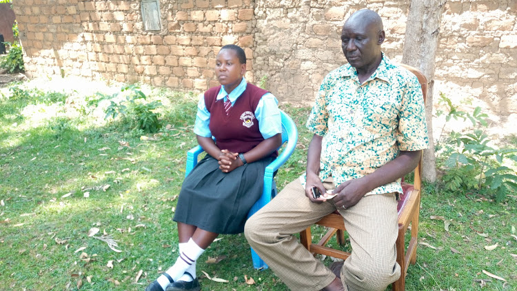 Retired police officer Vincent Irukani and Lilian Epalai at his home.