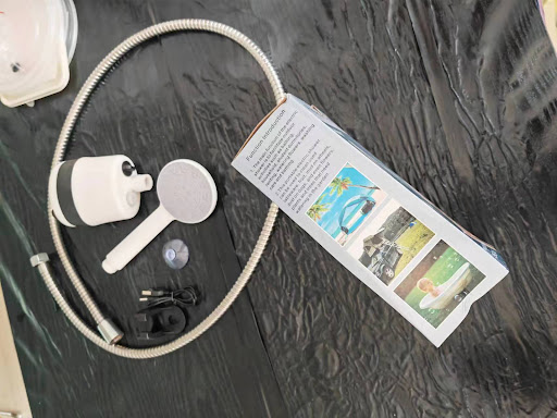 Title 7, Rechargeable Electric Outdoor Shower for Babies...