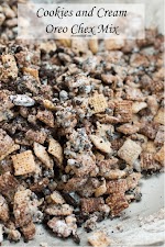 Cookies and Cream Oreo Chex Mix was pinched from <a href="http://www.ohsweetbasil.com/2014/09/cookies-cream-oreo-chex-mix-recipe.html" target="_blank">www.ohsweetbasil.com.</a>
