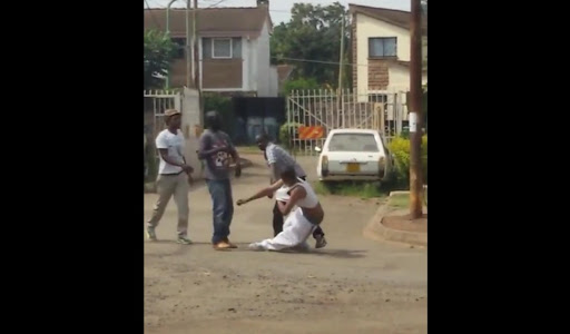 Watch Two Drunks Fight In Lang'ata Over Estate Bar Maid (VIDEO)