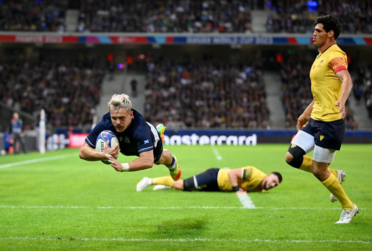 Darcy Graham scores Scotland's fourth try in their Rugby World Cup win agianst Romania at Stade Pierre Mauroy on in Lille, France on Saturday night.