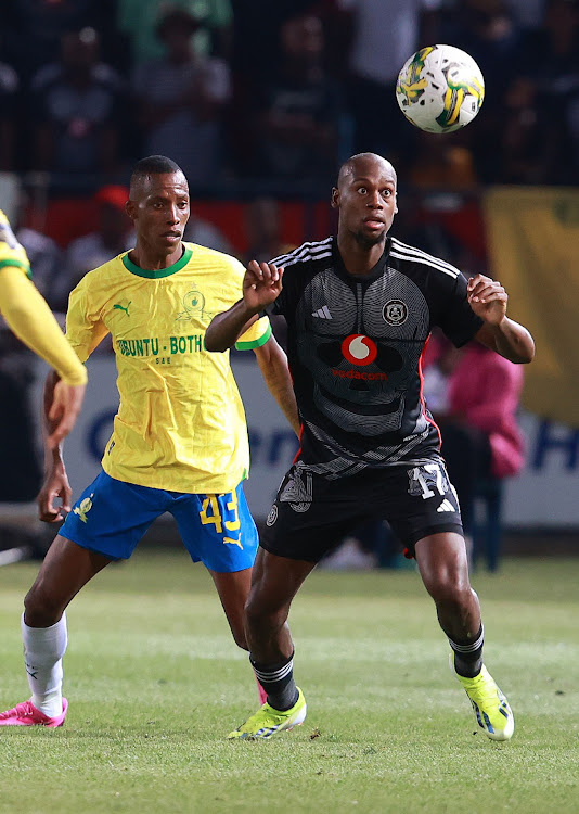 Evidence Makgopa of Pirates and Davine Lunga of Sundowns during the DStv Premiership match between Mamelodi Sundowns and Orlando Pirates at Loftus Versfeld Stadium in Pretoria.