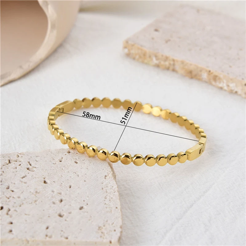Title 1, Bracelet en acier titane avec perles rondes ten...