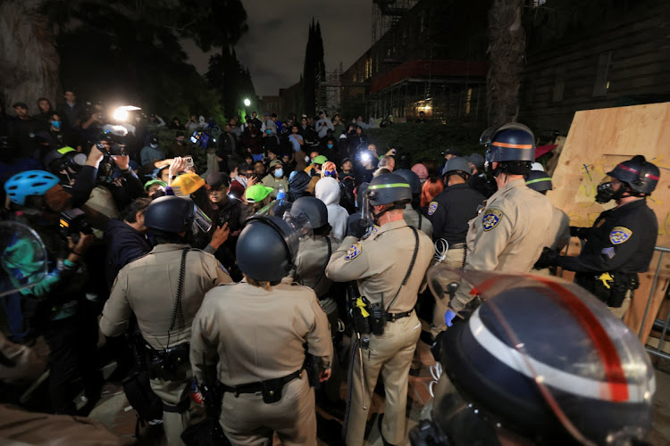 Police officers try to clear an encampment of Gaza supporters on the University of California Los Angeles campus, in Los Angeles, California, the US, May 1 2024. Picture: REUTERS/DAVID SWANSON