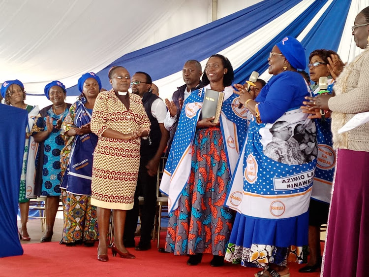 Kirinyaga religious women leaders presents a Bible to Azimio la Umoja presidential running mate Martha Karua.