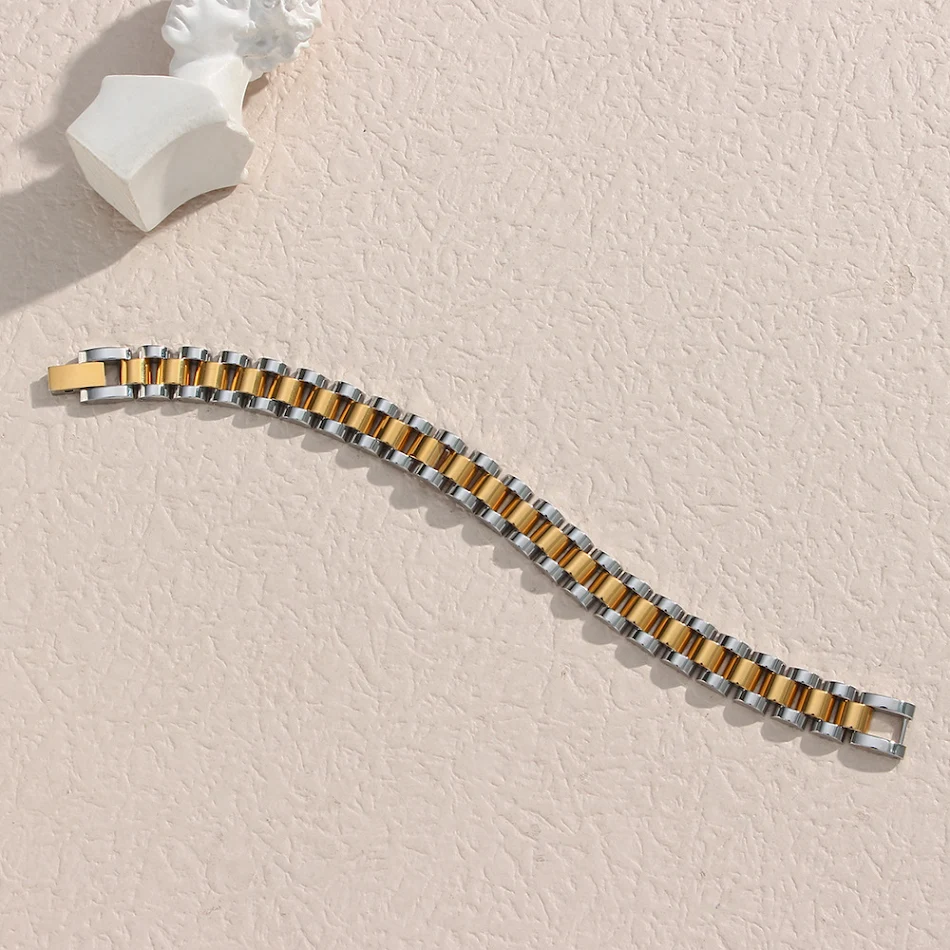Bracelet tendance en acier inoxydable bicolore, bijou de luxe léger, pour un style sophistiqué et une allure élégante.