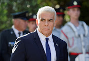 Israeli Prime Minister Yair Lapid arrives at the President's house for the Israeli Medal of Honor ceremony, in Jerusalem, July 14, 2022. 