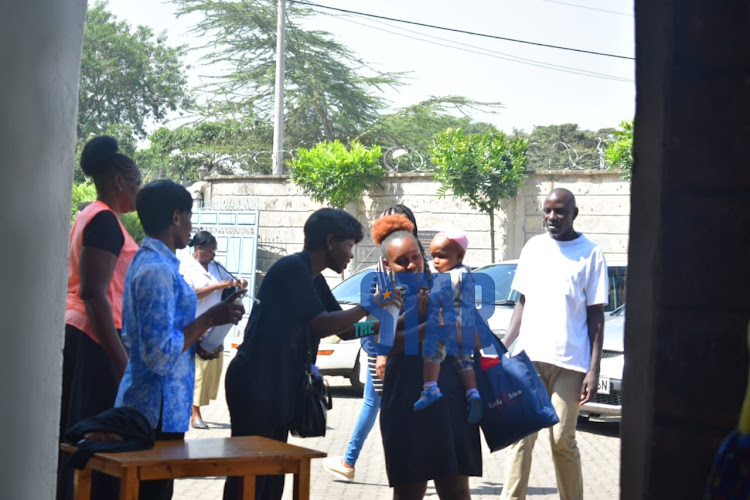 Church faithful sanitise their hands right before they attend service at St Phillips in Jericho on March 15,2020 /CHARLENE MALWA