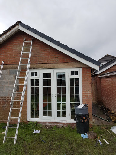 refitting of an older set of doors to a garage which we also fascia'd 