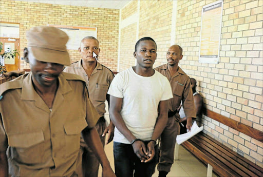 Norman Mukunuwendo appeared in the Mdantsane Magistrate's court yesterday for charges of escaping from lawful custody to be added in his charge sheet. Picture: MALIBONGWE DAYIMANI