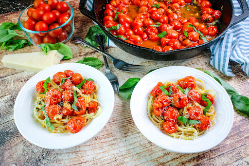 Plates of Quick Burst Tomato Sauce and Pasta.