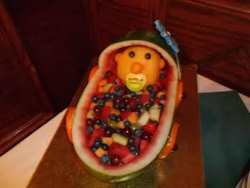 Baby in a bassinet fruit center piece