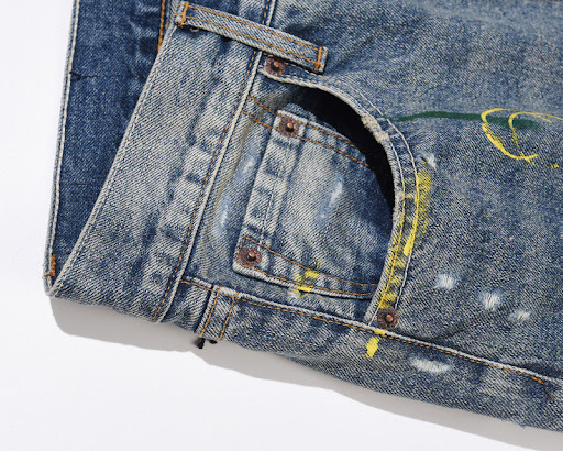 Title 5, Distressed Casual Jeans featuring a water print...