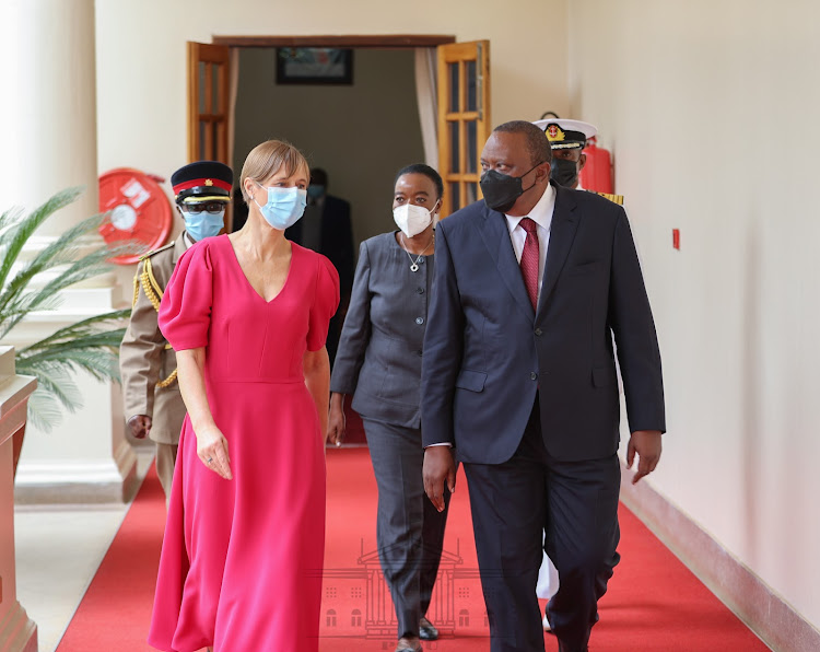 The two walking to the meeting room at State house.