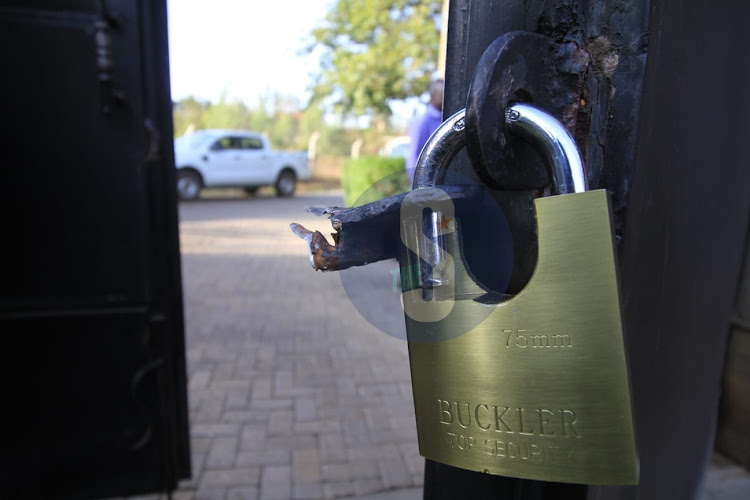 Broken gate lock at former Interior CS Fred Matiang'i's home on February 15, 2023.