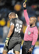 FAILED: PSL referee Buyile Gqubule shows Chiefs skipper Itumeleng Khune the yellow card
      PHoto: Gallo Images