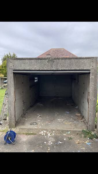 Asbestos garage taken down album cover