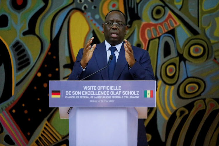 Senegal President Macky Sall speaks during a press conference with German Chancellor Olaf Scholz at the presidential palace in Dakar, Senegal, May 22 2022. Picture: NGOUDA DIONE/REUTERS