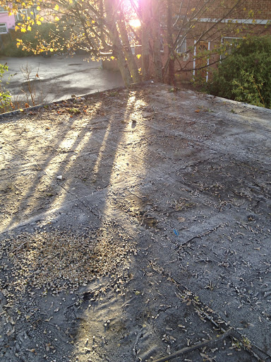 Before felt and decking being ripped up.