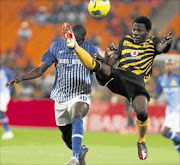 BEST FOOT FORWARD: Nyasha Mushekwi, left, and Lincoln Zvasiya during the Absa Premiership match between Kaizer Chiefs and Mamelodi Sundowns at Soccer City  last night.    PHOTO: ANTONIO MUCHAVE