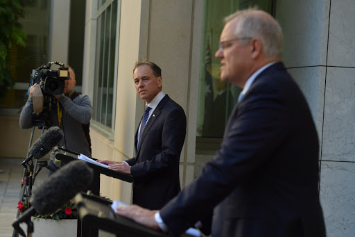 Prime Minister Scott Morrison and Minister for Health Greg Hunt (left) during a press conference