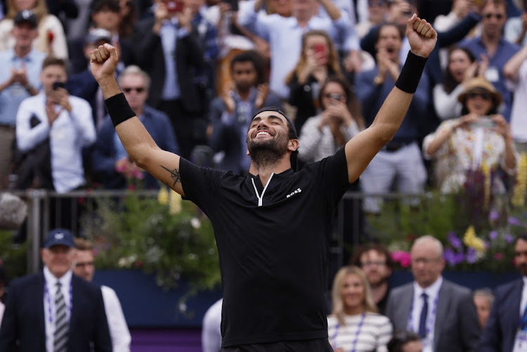 Italy's Matteo Berrettini celebrates after winning his Queen's Club Championship final against Serbia's Filip Krajinovic in London, on June 19, 2022