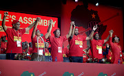 EFF leadership, from left, national chairperson Dali Mpofu, treasurer-general Leigh-Ann Mathys, president Julius Malema, deputy president Floyd Shivambu, secretary-general Godrich Gardee and deputy secretary-general Hlengiwe Mkhaliphi sing during party's national assembly on Saturday. Many of the top 6 didn't return to their posts.