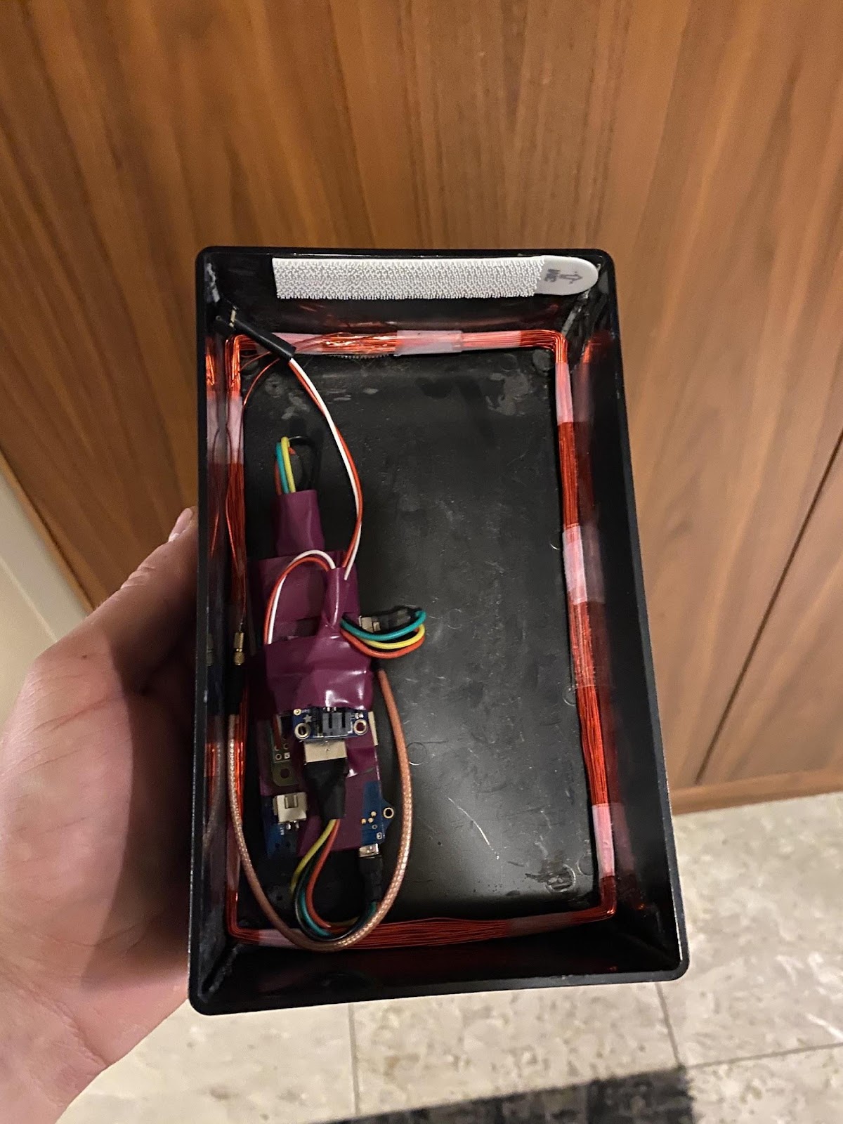 All components enclosed together in the "public facing box" of the RFID skimmer of Skim Job by White Oak Security