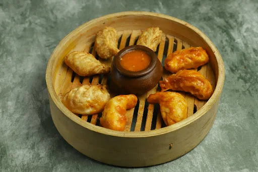 Chicken Schezwan Fried Momos (3pcs) with Chicken Fried Momos (3pcs)