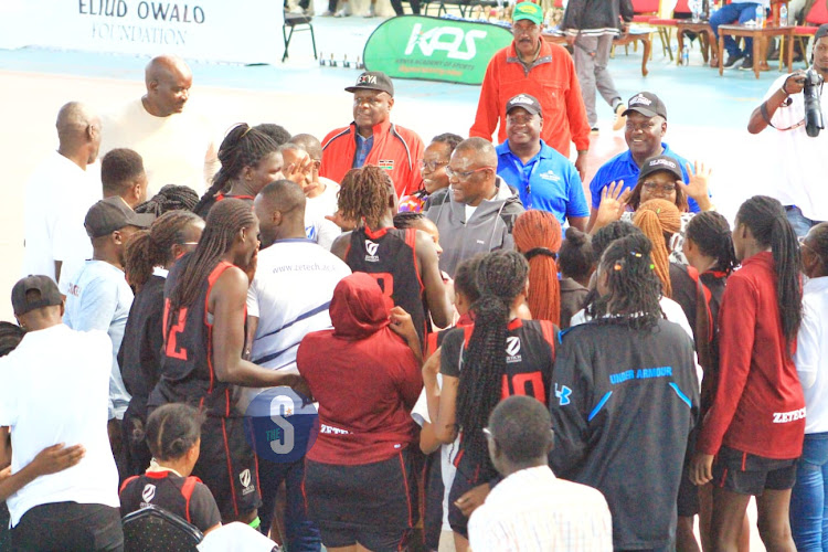 ICT CS Eliud Owalo joins Zetech Sparks in celebrating their victory after beating KPA women in the finals at Ulinzi Sports Complex on May 12, 2024.