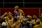 Moruti Mthalane hoisted high as he wins by TKO against Genesis Libranza during the Boxing from Wembley Arena on April 28, 2017 in Johannesburg, South Africa.