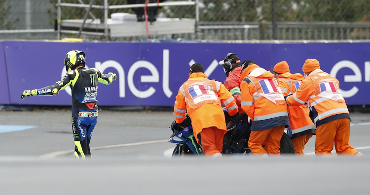 Monster Energy Yamaha's Valentino Rossi reacts after crashing out of the race.