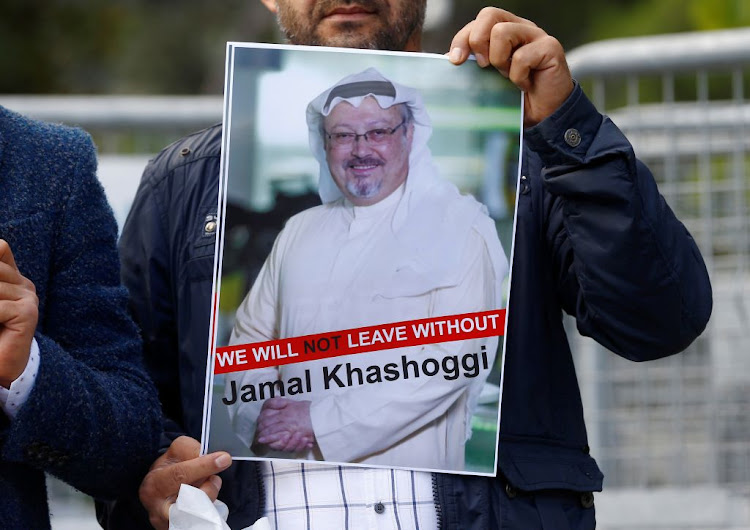 A demonstrator holds picture of Saudi journalist Jamal Khashoggi during a protest in front of Saudi Arabia's consulate in Istanbul, Turkey, on October 5 2018.