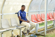 Orlando Pirates interim coach Rulani Mokwena, pictured here alone on the bench at Makhulong Stadium, was a relieved man after the final whistle in Tembisa.   