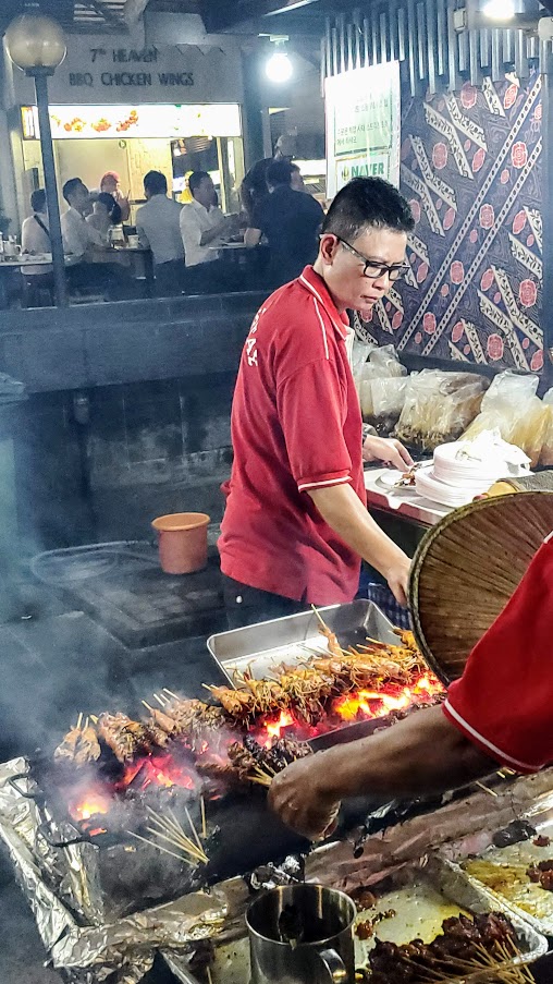 Guide to visiting hawker centers in Singapore- a look at Lau Pa Sat for Satay Street in the evening