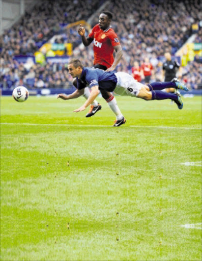 BOUNCING BACK: Danny Welbeck of Manchester United in action with Phil Jagielka of Everton during their Premier League match on Saturday. Photo: Getty Images