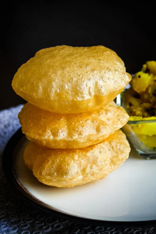 Halwa Puri (4 Pcs) Aloo Sabji