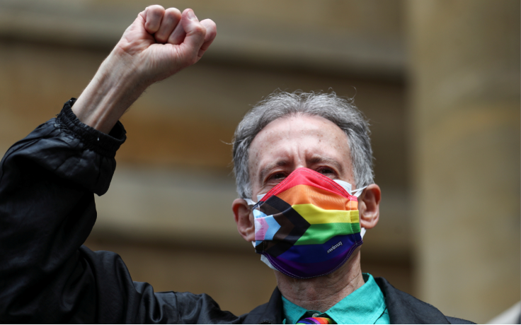 Veteran British LGBT rights campaigner Peter Tatchell wearing a face mask takes part in the Gay Liberation Front (GLF) pride march in London, Britain, on June 27 2020.