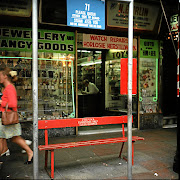 A bench at a bus stop reserved for the use of whites only in Johannesburg in the 1960s.