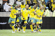 THAT WINNING FEELING: Bafana players celebrated after mistakenly thinking they had qualified for the Africa Cup of Nations with a 0-0 draw against Sierra Leone in 2011. Sadly, they had got their sums wrong.